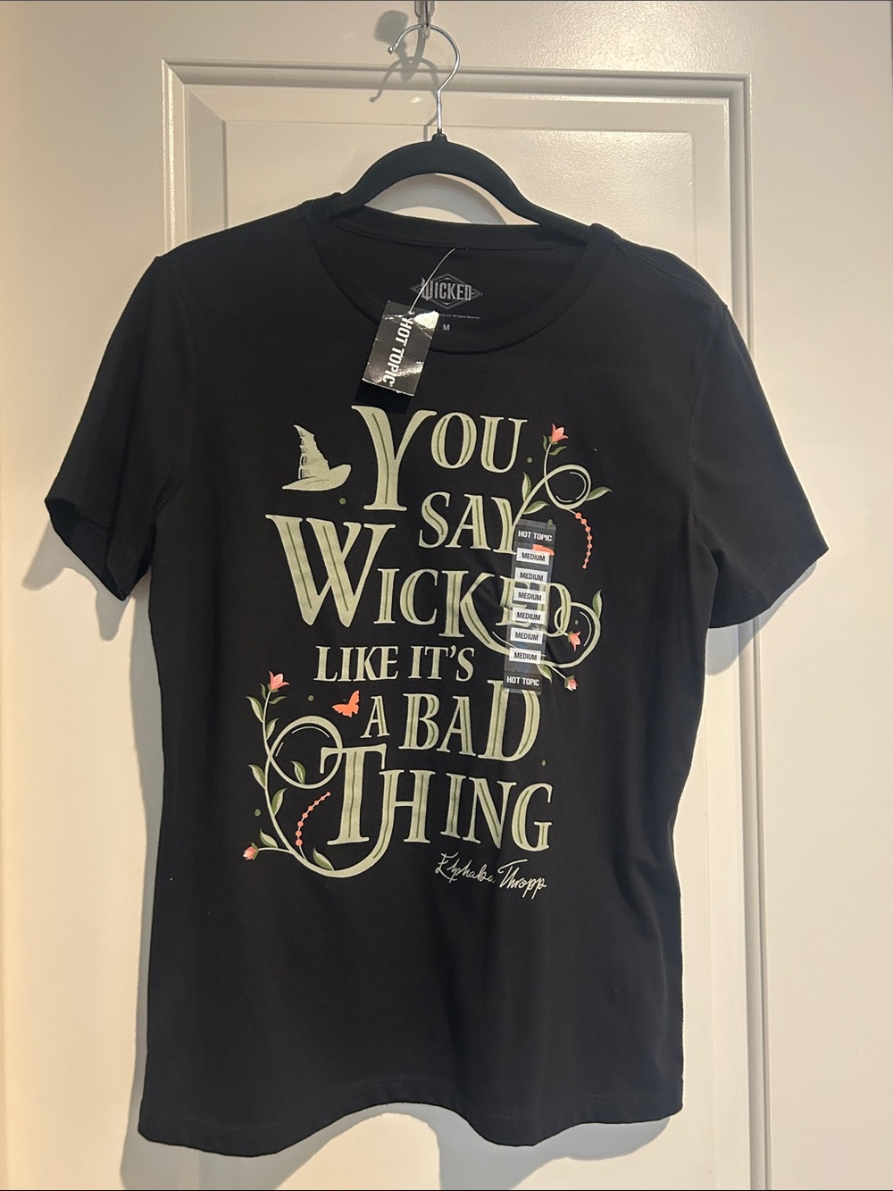 Hot Topic Black Graphic Tee with Pale Green & Pink Accents